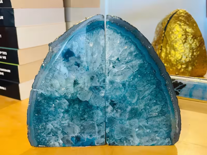 presse-livres bleu sarcelle or