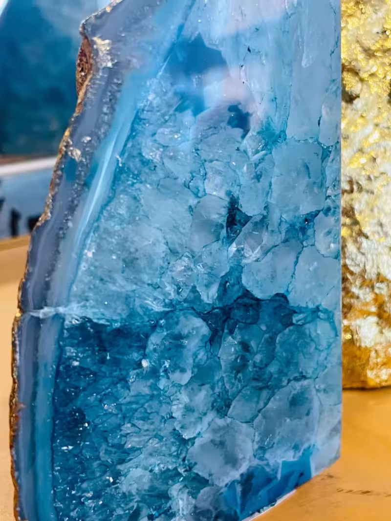 presse-livres bleu sarcelle or